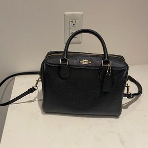 Coach black leather satchel.